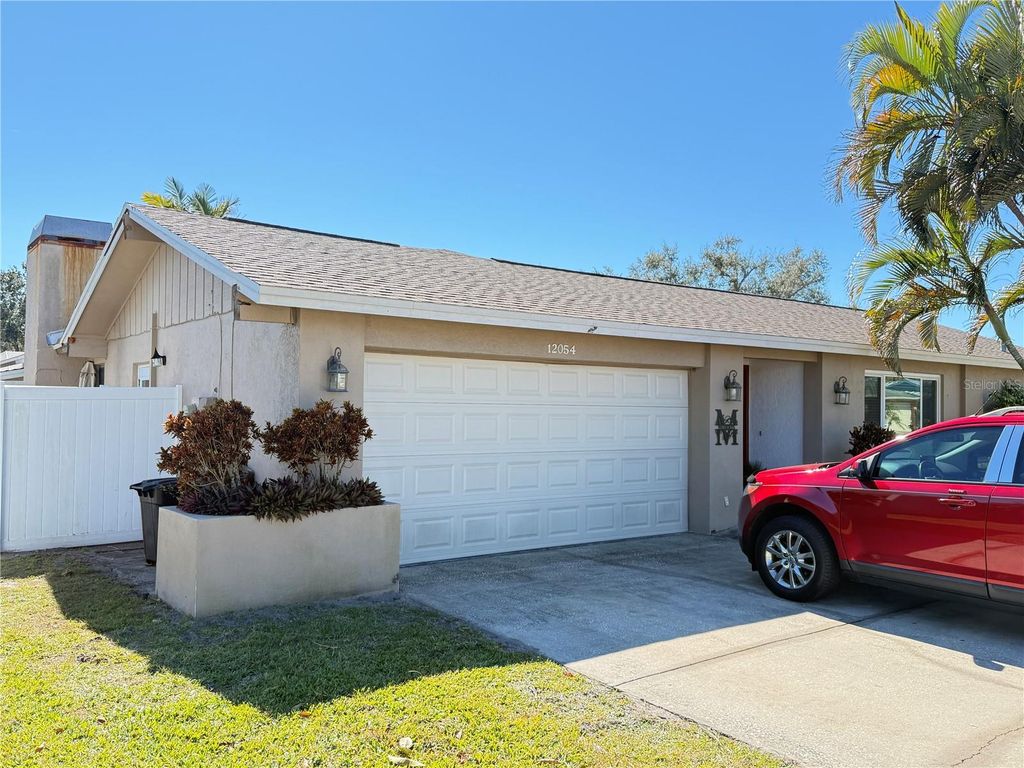 Photo of 12054 101st Avenue, Seminole, FL 33772 (MLS # TB8474074)