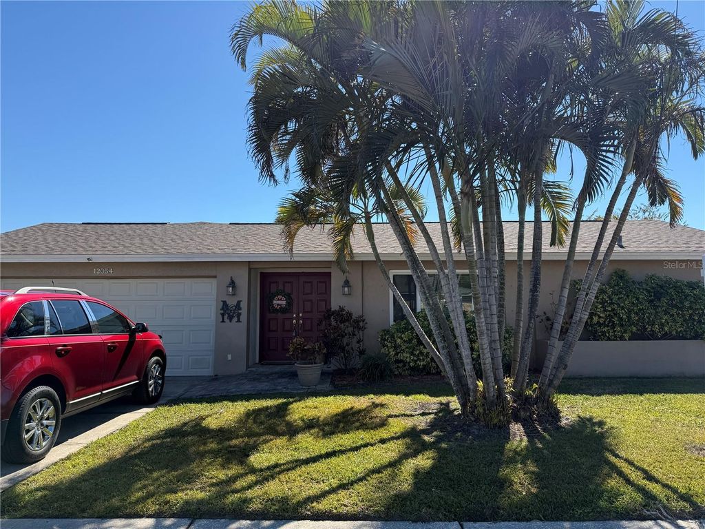 Photo of 12054 101st Avenue, Seminole, FL 33772 (MLS # TB8474074)