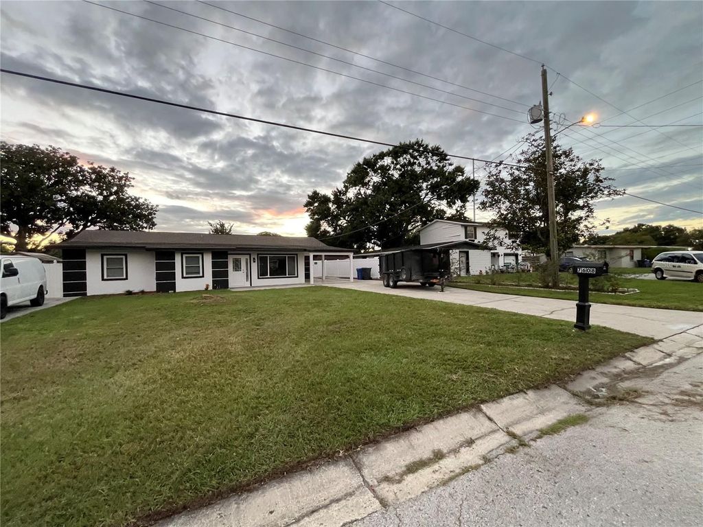 Photo of 7608 Lakeside Boulevard, Tampa, FL 33614 (MLS # TB8433449)