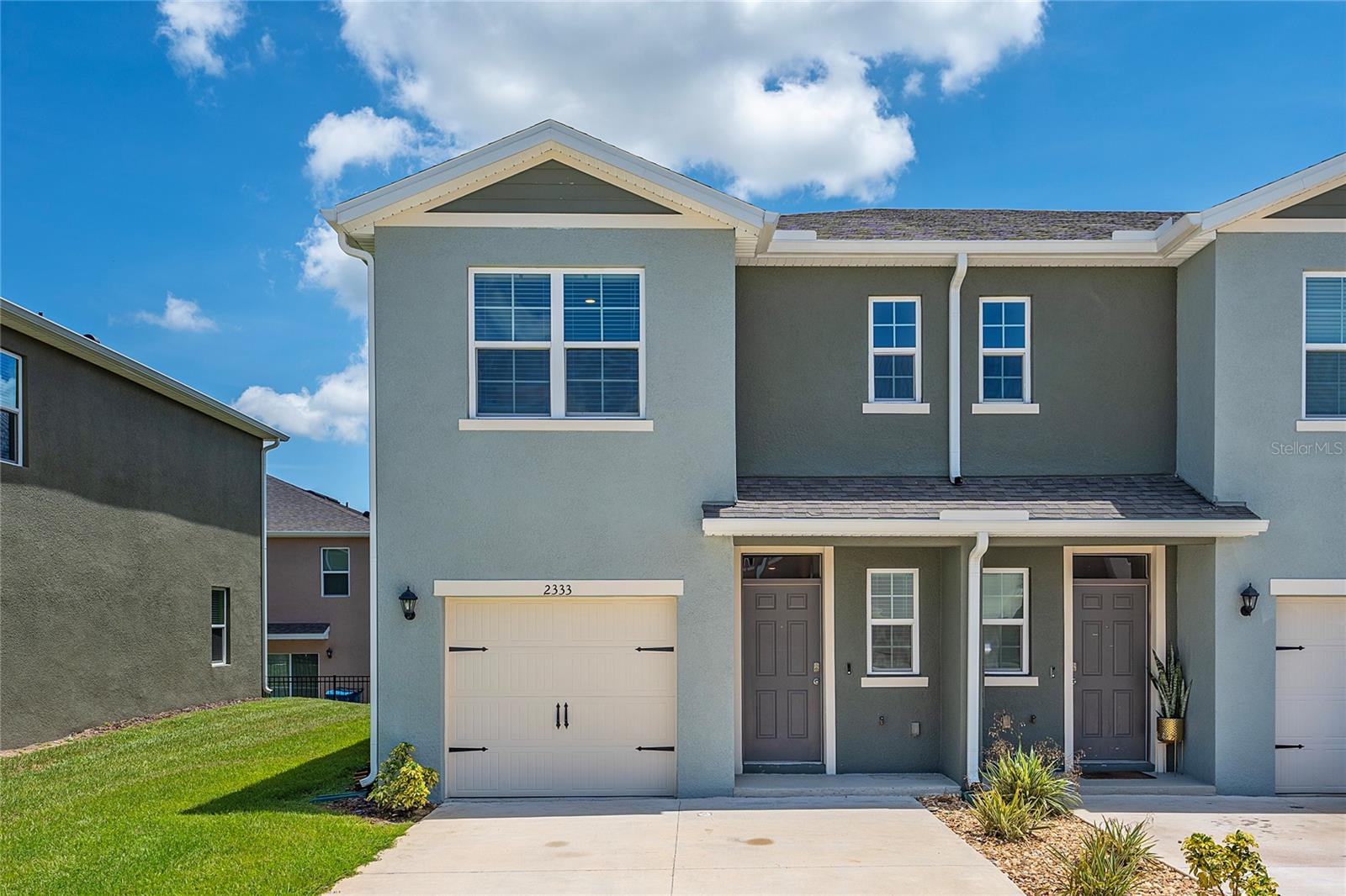 Beautiful and spacious 3-bedroom, 2.5-bath Townhouse located in a peaceful Davenport community. Built in 2024, this stunning home features a modern kitchen with stainless steel appliances, ample cabinet space, and that flows to a patio. Upstairs offers a lovely primary suite with dual sinks, two additional bedrooms, and a laundry area. Enjoy a community pool and playground, plus an excellent location near shopping, dining, Disney theme parks and major highways. Call me for more information.