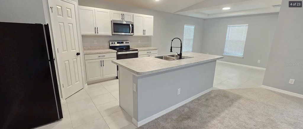 Photo of 1532 NE 35th Ter, Cape Coral, FL 33909 (MLS # D6146463)