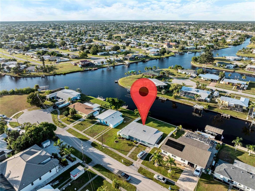 Photo of 581 Lindley Terrace, Port Charlotte, FL 33952 (MLS # C7516333)