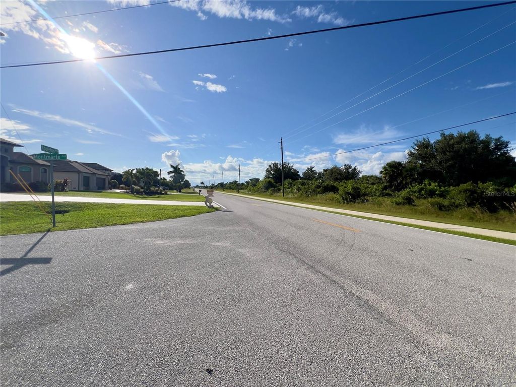 Photo of 14242 Montmarte Avenue, Port Charlotte, FL 33981 (MLS # S5136429)