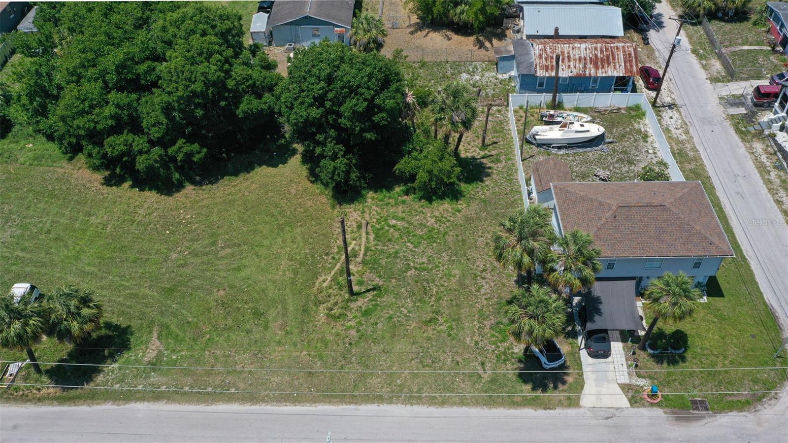 # Build Your Dream Home in Historic Ybor City!
Looking for the perfect spot to build your dream home? This quiet residential lot in the vibrant Ybor neighborhood offers a blank canvas for your imagination! Nestled on a peaceful street, this buildable vacant lot provides a rare opportunity to create a custom home in one of Tampa's most character-filled areas.
Just steps from your future front door, you'll find the legendary Columbia Restaurant—Florida's oldest restaurant serving amazing Spanish cuisine for over a century. Talk about dinner plans solved! Imagine strolling over for their famous 1905 Salad whenever the mood strikes.
The exciting new Gasworx development project is also nearby, bringing fresh energy and amenities to the area. As Tampa continues to grow, this location puts you right in the middle of the action while maintaining that neighborhood feel.
This lot offers the perfect balance—quiet residential living with the pulse of the city just blocks away. Build exactly what you want without compromising on location or charm. The established neighborhood provides a sense of community while still letting you add your personal touch to the landscape.
Perfect for urban professionals, first-time homebuilders, or anyone looking to create something special in a neighborhood known for its rich history and bright future.