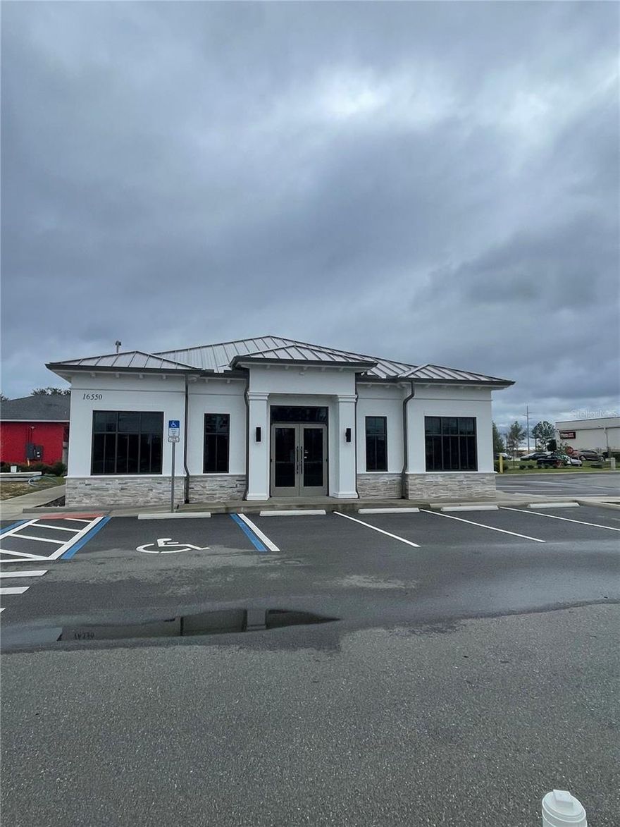 Sunrise Medical Plaza Vacant Building in Grey Shell Condition (Unit #3 and .06 acre) is located in 4 Corners (Clermont).  The building is brand new and very attractive with a standing seam metal roof.  It is designed for two tenants with separate entrances and electric meters, or finish the entire building for yourself.  The owner of this property also owns the adjacent lot and would be interested in selling this lot and the building together. This is a fairly new development, so it is ready to be built out. The location is excellent, heavy traffic counts on Highway 27, and there are several ways to access this property directly off of the highway. The property is south of CR 474 and north of I-92 on the east side of Hwy 27. 
Recent: 12/07/2023 : NEW