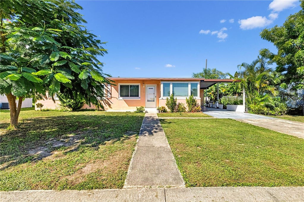 Photo of 21490 Gladis Avenue, Port Charlotte, FL 33952 (MLS # TB8552651)