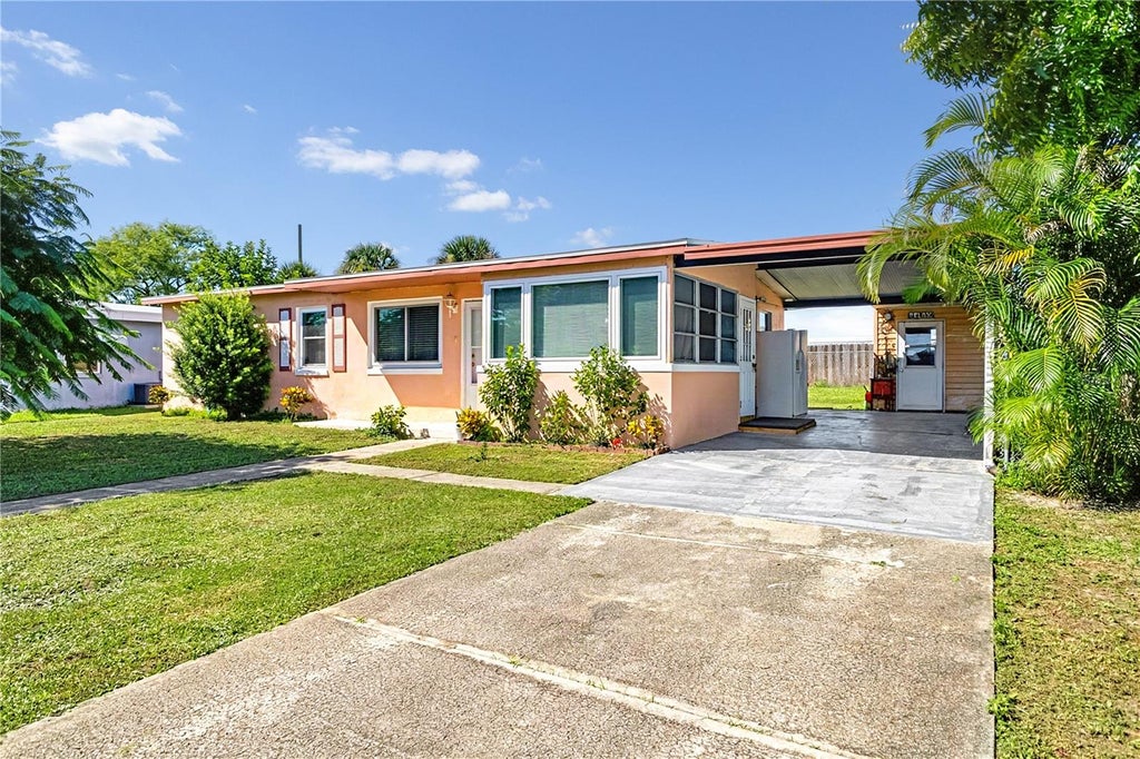 Photo of 21490 Gladis Avenue, Port Charlotte, FL 33952 (MLS # TB8552651)