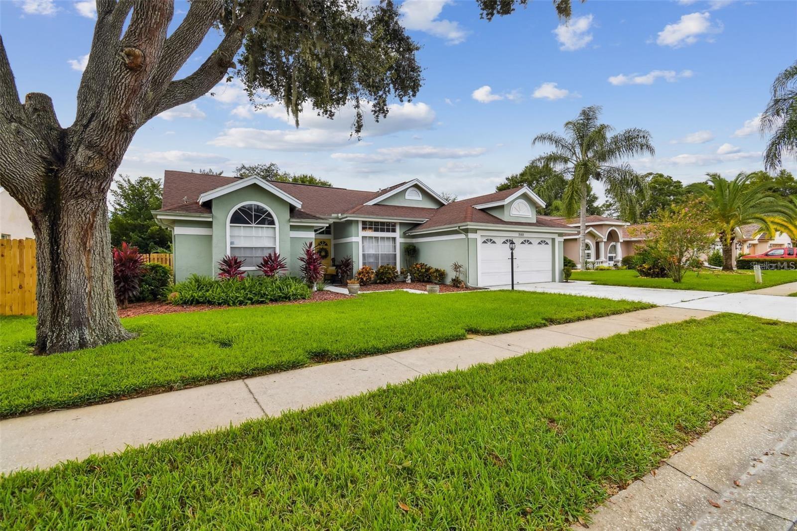 NEW ROOF WILL BE INSTALLED BY CLOSING!!!! Beautifully updated home near Starkey Market in the heart of Trinity –
Welcome to 3103 Ellington Way, a spacious 3-bedroom, 2-bathroom home offering 1,795 sq. ft. of main living space plus a 228 sq. ft. enclosed Florida room with mini split for these hot days in summer —bringing the total to 2,028 sq. ft. This versatile Florida room doubles as a bright sitting area, home office or craft room. Nestled in the highly desirable Sienna Woods community, which home entrance is through Ellington Estates, two blocks from downtown Longleaf. This home is just a short walk to the top-rated Longleaf Elementary School and sits only one mile from the renowned Starkey Market, a beloved destination for fresh local farm food and drinks, weekly events feature trivia/live music, and weekend gatherings!! Step inside to find an open, airy design with vaulted ceilings and a cozy fireplace, creating a warm, inviting atmosphere. The kitchen is a true centerpiece, boasting granite countertops, soft-close drawers and cabinets, and high-end flooring that flows seamlessly throughout the home. The formal dining room and sunny nook provide dedicated spaces for family meals and entertaining, while the enclosed Florida room offers flexibility as a dual home office, playroom, or reading retreat. The oversized primary suite feels like a private sanctuary, featuring dual walk-in closets and a fully updated bathroom with dual sinks, a dedicated beauty vanity, and spa-like finishes—plus an on-demand hot water heater for endless comfort. Two additional bedrooms, each generously sized, round out the home’s well-thought-out layout—making it an incredibly functional home with no compromises. A brand-new roof will be completed before closing, offering peace of mind for years to come. Outside, the fenced yard is a private oasis with fruit trees (including bananas, acerola cherries, star fruit and persimmon!), lush greenery, and a large pavered patio perfect for cookouts, morning coffee, or evening gatherings. Just a short walk to downtown Longleaf and Starkey Market make this home ideal for anyone looking to put roots in this area!