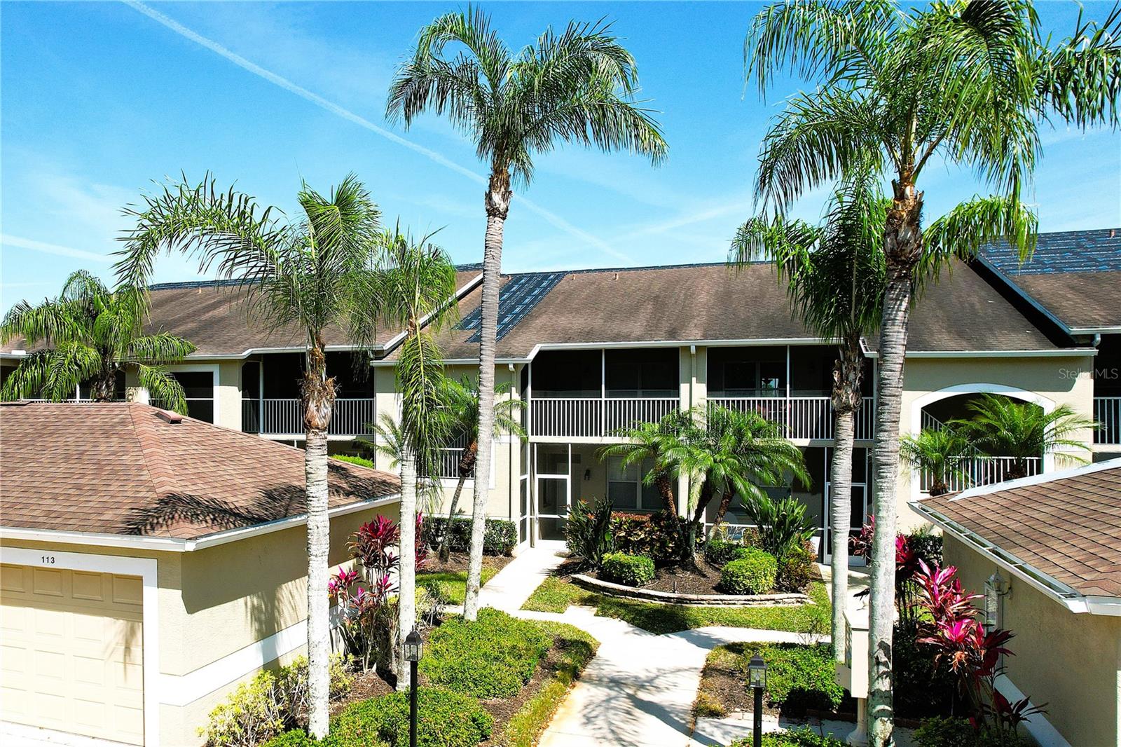 Short Sale. GOLF FOR FREE - You'll save so much $$$ on your purchase of this Heritage Oaks condo, that's what it will feel like! Ground floor unit just off the 13th green. Your garage is right out your front door, so bringing groceries in is a breeze without stairs! Bundle golf with a massively renovated clubhouse mere days away from completion. Fantastic community with pools, gym, bars, and Golf cart friendly. it is the Florida Golf lifestyle at its best. All assessments are paid, condo is being sold ""Turn Key Furnished**. Updated flooring in the living area, well-appointed and ready for new owners. 'All terms are contingent on Lender's approval.'