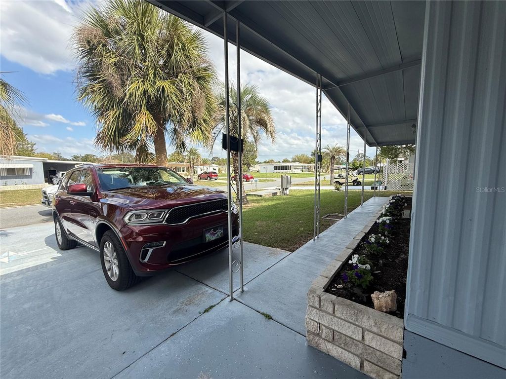 Photo of 7441 Fairlane Avenue, Brooksville, FL 34613 (MLS # TB8487201)