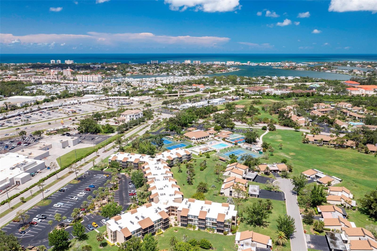 Welcome to this beautifully updated and fully furnished ground-floor 2-bedroom, 2-bath condo in the highly desirable Sandpiper building within Bird Bay Village. Offering 940 square feet of bright and inviting living space, this turnkey unit has been thoughtfully refreshed over the past five years, including a stylish kitchen with updated countertops, white cabinetry, stainless steel appliances, and a modern tile backsplash. The open dining and living areas provide a comfortable, flowing layout with easy-care surfaces and no carpet throughout. Floor-to-ceiling sliders lead out to a private screened lanai framed by vibrant landscaping, perfect for relaxing or entertaining. Both bedrooms offer en-suite access to their own full bathrooms and include generous closet space, with the primary suite enjoying tranquil garden views. The building features a newer roof, on-site laundry, an elevator, and a dedicated storage closet for added convenience. The HOA fee covers water, sewer, trash, cable, and exterior maintenance for easy ownership. Bird Bay Village boasts outstanding amenities including a resort-style pool, tennis and pickleball courts, fitness center, shuffleboard, library, clubhouse, and scenic walking trails. Located just minutes from Venice Island’s beaches, historic downtown, shopping, dining, the Legacy Trail, and quick access to I-75. **THIS PROPERTY QUALIFIES FOR A 1% LENDER INCENTIVE IF USING PREFERRED LENDER. INQUIRE FOR MORE DETAILS.**