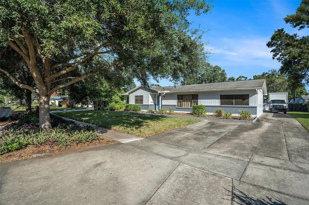 Photo of 10910 Carrollwood Drive, Tampa, FL 33618 (MLS # TB8439605)