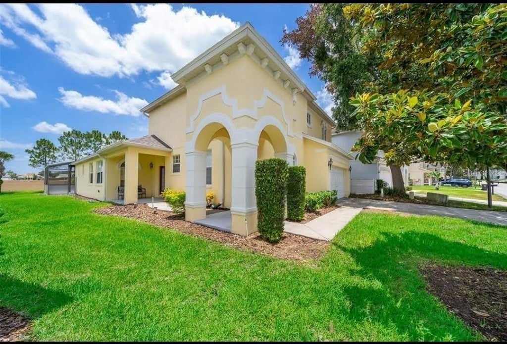 Photo of 492 Tupelo Circle, Davenport, FL 33897 (MLS # O6427291)