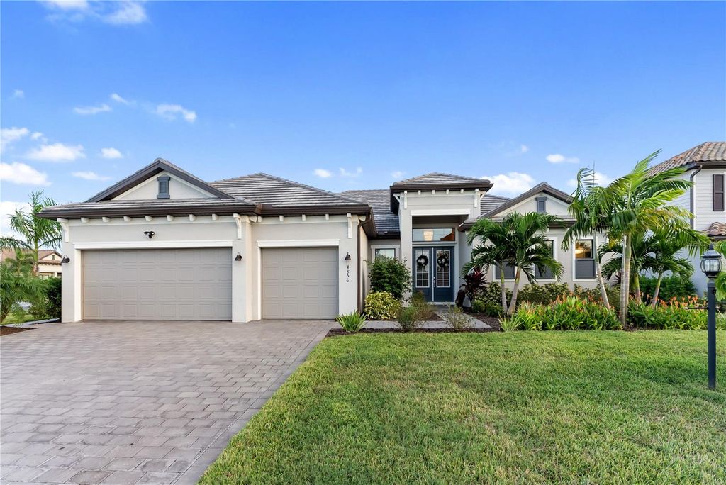 Photo of 4856 Coastal Days Lane, Bradenton, FL 34211 (MLS # A4667843)