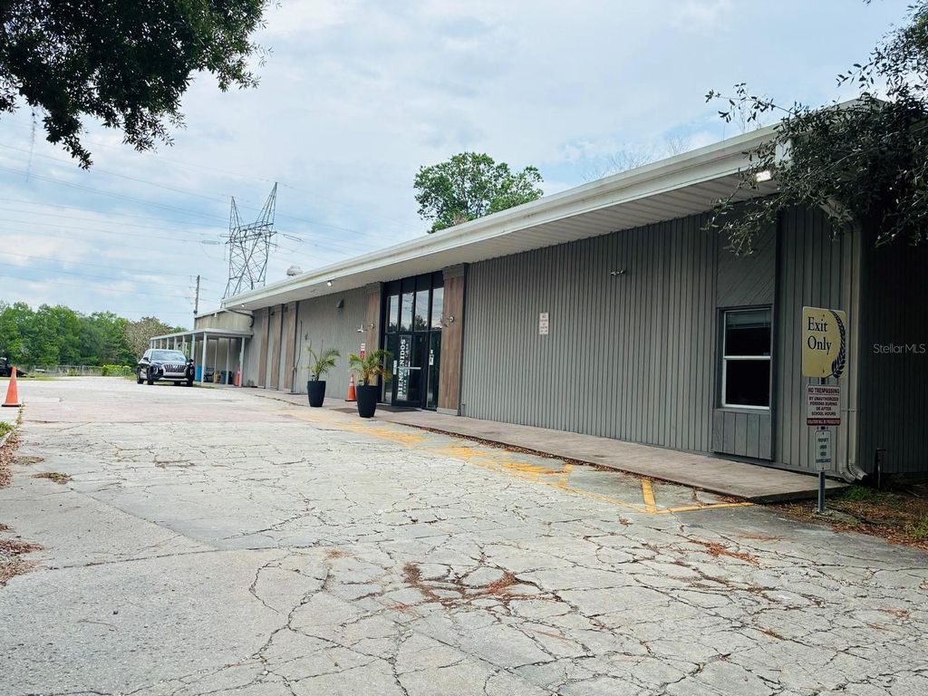 Photo of 7540 Grand Ave, Winter Park, FL 32792 (MLS # O6406821)