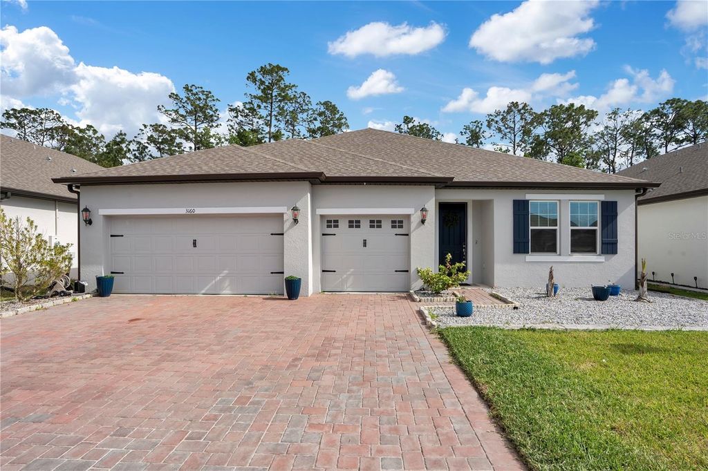 Photo of 3160 Firethorn Circle, Daytona Beach, FL 32124 (MLS # O6396609)