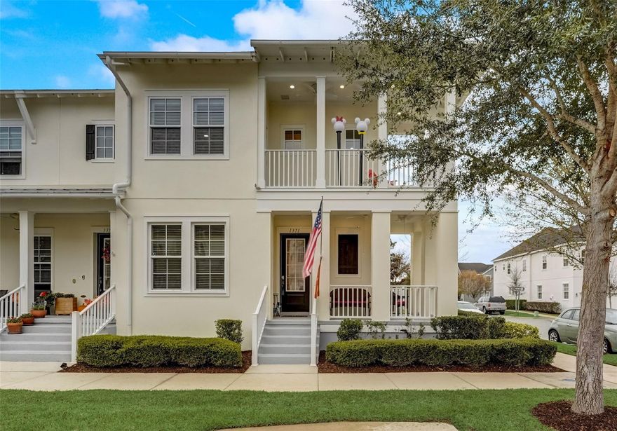 Welcome home to this charming end unit townhome located in the desirable Celebration Spring Lake community. The inviting wrap around porch and balcony are the perfect spot to enjoy your morning coffee while overlooking the neighborhood. At the front of the home is the perfect bonus space that makes for a great work from home office or playroom for the little ones. As you continue into the home, you’re welcomed into the open concept livable space. High ceilings and plantation shutters elevate the space with wood flooring flowing seamlessly throughout. This immaculate kitchen features granite countertops, stainless steel appliances (new refrigerator and induction cooktop 2023), and beautiful backsplash extending up with the range hood. Upstairs are all the bedrooms with the laundry closet in the middle for convenience. The primary bedroom is a spacious room with a beautiful ensuite offering a double vanity sink and walk in stand-up shower with a walk-in closet. The private balcony can be accessed through the primary bedroom for the ultimate relaxation space.  Celebration is a residential community where families can enjoy parks, playgrounds, community pools and expansive nature trails, miles of walking/biking trails and an abundance of fine dining and shopping options right in town. Schedule your private showing today!
