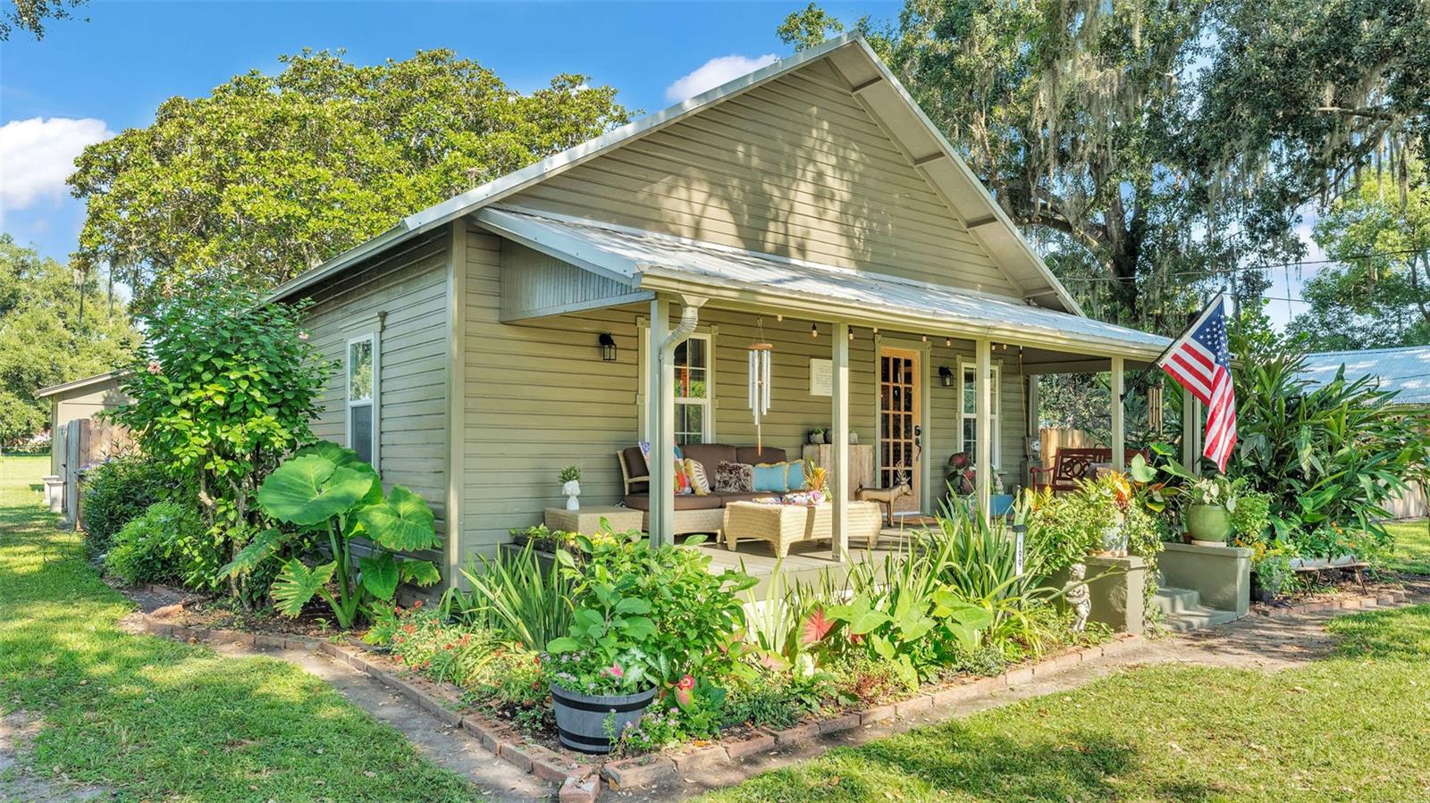 This beautifully remodeled 2-bedroom, 2-bath bungalow offers the charm of a classic home with all the modern updates you’ve been looking for—plus the potential for a third bedroom! Step inside to discover a fully updated kitchen featuring quartz countertops, new cabinetry, a stunning real brick backsplash, and all-new flooring throughout. The living space showcases high ceilings, a cozy wood-burning fireplace, and the warmth of knotty pine walls and ceilings, adding timeless character.
Thoughtfully designed, the layout easily accommodates a third bedroom conversion if desired. Outside, you'll find a spacious, fully fenced yard complete with mature landscaping, a dedicated chicken area, and two sheds—one 12.5 x 10.5 and another 10 x 20.
With no HOA and no leasing restrictions, this property offers incredible flexibility and investment potential. Whether you're looking for a cozy homestead or a smart income-producing opportunity, this one checks all the boxes!