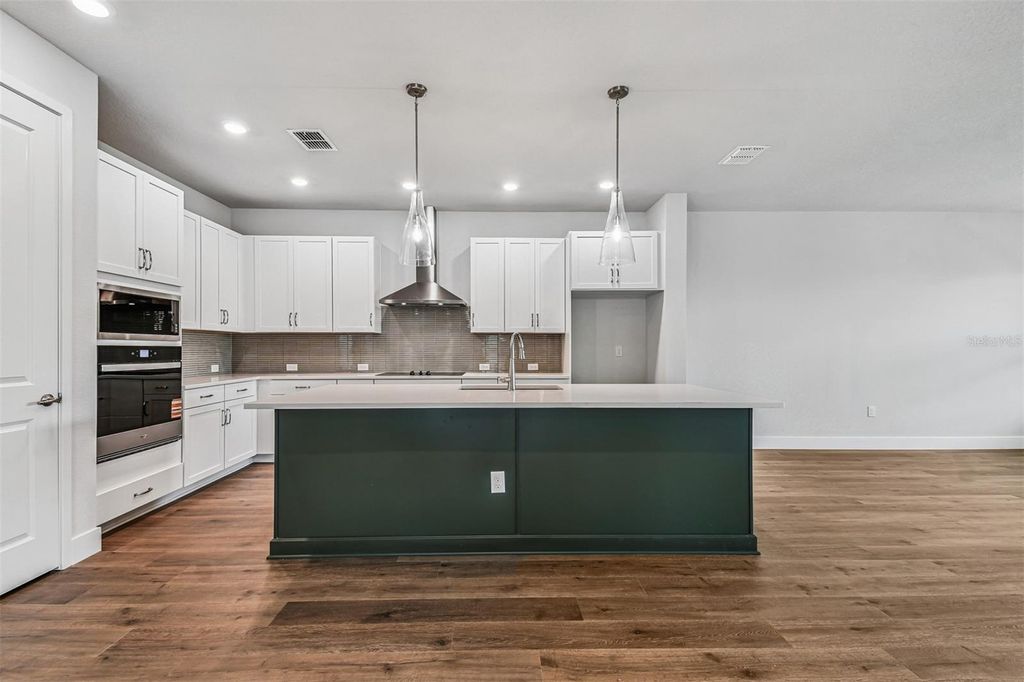Photo of 10653 Crescent Creek Crossing, Parrish, FL 34219 (MLS # TB8421919)
