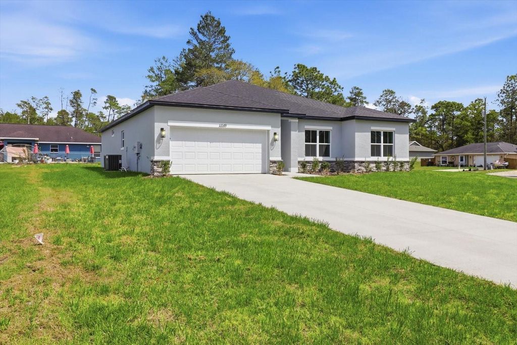 Photo of 6349 SW 134th Loop, Ocala, FL 34473 (MLS # O6395459)