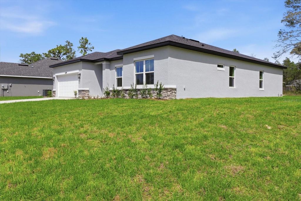 Photo of 6349 SW 134th Loop, Ocala, FL 34473 (MLS # O6395459)