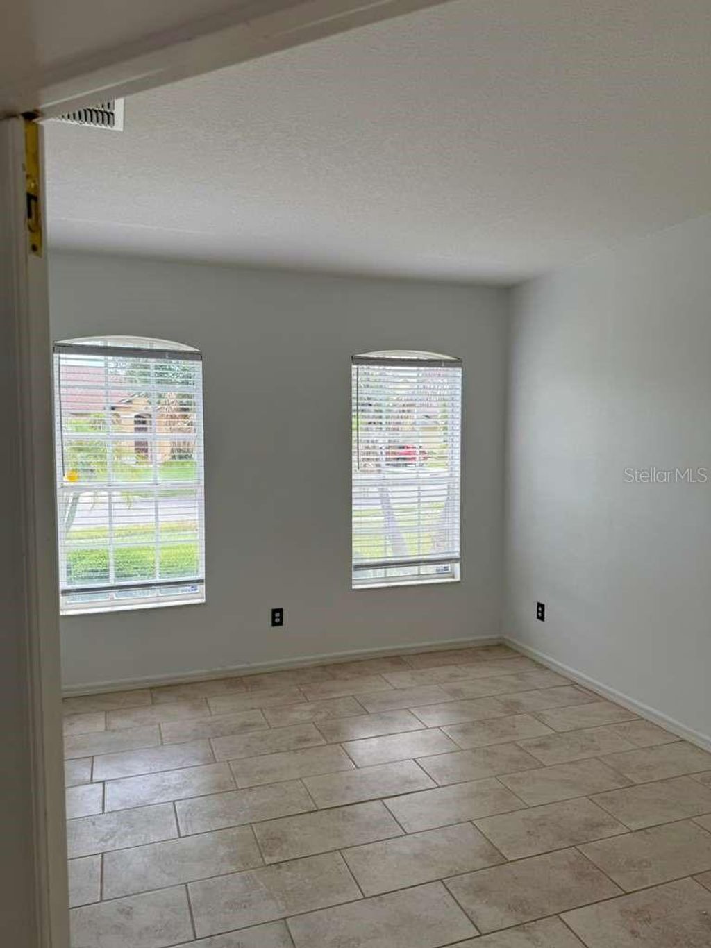 Photo of 13832 Hawk Lake Dr, Orlando, FL 32837 (MLS # S5150960)