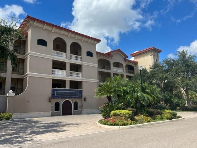 Live your best life in the heart of Lakewood Ranch! This meticulously maintained furnished 3-bedroom, 2.5-bathroom condominium offers a short stroll to downtown Main Street, where you can immerse yourself in a variety of shops, restaurants, a movie theater, and engaging community events. As you step inside, you'll immediately appreciate the spaciousness of the open floor plan, accompanied by views of the preserved area throughout the residence. Experience tranquility on your screened lanai, accessible from both the Living Room and Master Bedroom, with serene views of the preserve. This is a well-designed split floor plan, featuring 2 bedrooms at the front of the unit, one furnished as an office, while the master bedroom and en-suite bathroom are discreetly tucked away at the back, complete with sliding doors that lead to the lanai. The master bedroom boasts a king size bed, the convenience of two walk-in closets and the en-suite with walk-in shower and tub. The dining room offers ample space for dining making it perfect for hosting gatherings. The laundry room is thoughtfully equipped with a closet, cabinets, sink, and ample countertop space for your laundry needs. This charming condo includes 2 parking spaces and storage within the parking garage, and secured lobby elevator entrance. In addition to the gated security. Residents can take full advantage of the clubhouse amenities, which include a fitness center, a heated pool and spa, a fully equipped kitchen, and a conference room. Convenience is paramount in this location, with proximity to the UTC Mall, a plethora of restaurants, golf courses, St. Armand's Circle, and short drives to the stunning beaches of Siesta Key, Lido Key, Longboat Key, Anna Maria Island, and the Sarasota-Bradenton International Airport (SRQ). Whether you seek vibrant urban living or serene coastal retreats, this Lakewood Ranch condo offers it all. Sorry, no pets allowed. Schedule a showing today.