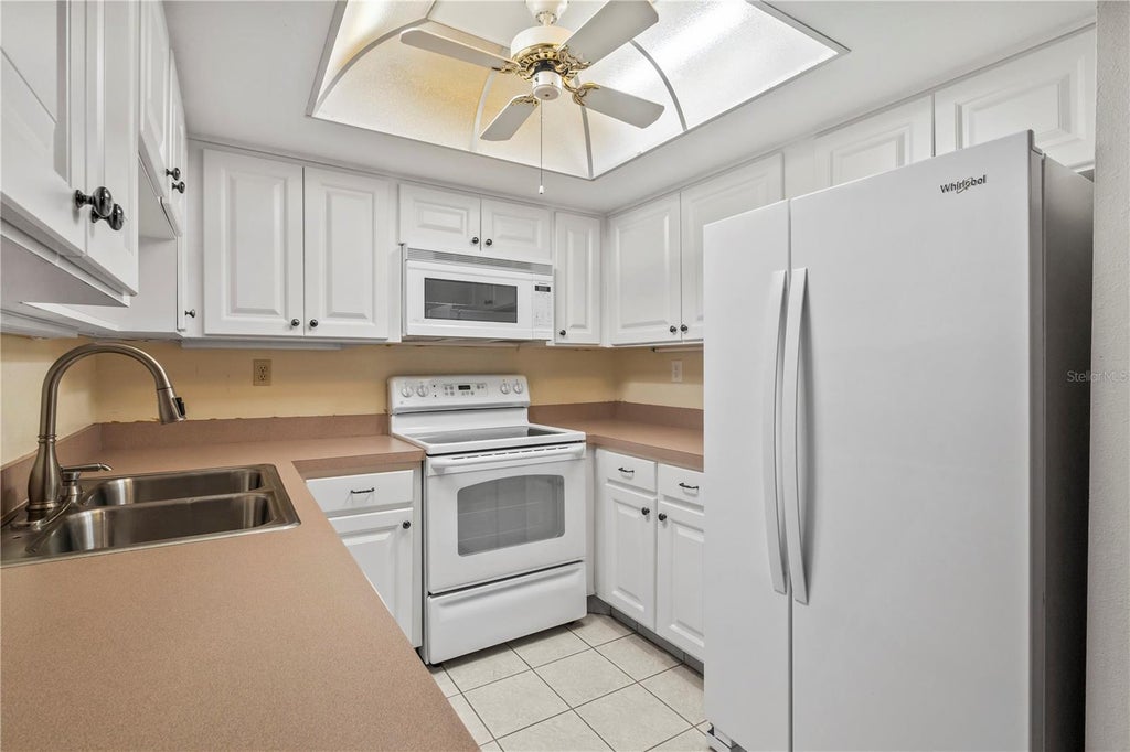 Photo of 1609 Whitebridge Drive #A, Palm Harbor, FL 34684 (MLS # TB8543982)