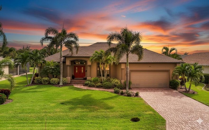 Waterfront Living! Experience the quintessential Florida lifestyle in this stunning and meticulously maintained 3-bedroom, 2-bathroom home located directly on the beautiful Rotonda Waterway. With its bright, open floorplan and gorgeous water views, this residence is an entertainer's dream and a peaceful private retreat, all in one. The home is an exceptional find, featuring an extensive list of Builder upgrades and recent major improvements, ensuring true move-in readiness.
Entertain effortlessly in the spacious, screened lanai overlooking the canal. The adjacent dinette features a picturesque aquarium window that perfectly frames your tranquil water views, bringing the Florida scenery indoors. Designer Finishes: The living area, kitchen, and primary suite are elevated by sophisticated builder upgrades, including high coffered ceilings and elegant 5-inch crown molding. The main living areas and secondary bedroom boast beautiful, easy-to-maintain 18-inch porcelain tile. The heart of the home features maple wood cabinets, recessed lighting, upgraded plumbing fixtures, and top-of-the-line Stainless Steel Frigidaire Gallery Appliances. The desirable split floorplan provides maximum privacy for the expansive primary suite with gorgeous coffered ceilings and crown moulding. Enjoy upgraded tile work in the showers and baths, as well as a Roman Style shower & dual vanities, adding a touch of custom luxury.  The third bedroom is currently utilized as a bright and comfortable home office with reading area. 
Enjoy years of worry-free living with a new roof installed in 2024 and a new LG Washer & Dryer, Refrigerator were also installed in 2024. 
The exterior is beautifully finished with stunning glass front doors and an elaborate custom paver package for the driveway, pathway, and extended lanai/patio. The home sits on a beautifully maintained lot with a mix of majestic palms and native Florida plants, all nourished by an irrigation system with a canal-fed pump. A separate paver sitting area in the backyard offers an ideal spot to relax by the water.
The oversized 2-car garage features a painted and sealed floor (2020), offering a clean and durable space and plenty of room for projects. :
Located in the highly desirable, deed-restricted community of Rotonda West, you'll enjoy incredible convenience with low HOA fees and access to a local clubhouse with year-round activities.
You are just minutes from the world-class white sand beaches of Boca Grande and Manasota Key. Golf enthusiasts will appreciate being near 7 local Golf Courses, including the five courses managed by the Rotonda Golf & Country Club, offering a total of 99 championship holes. Enjoy the water access of the Rotonda Waterway, with multiple Marinas and boat ramps nearby for easy access to the Gulf. The area is renowned for its world-class tarpon fishing! Close to shopping, restaurants, and a community park with tennis/pickleball courts and a walking path. 
This is more than a home—it's your new Florida lifestyle. Schedule your exclusive showing today!