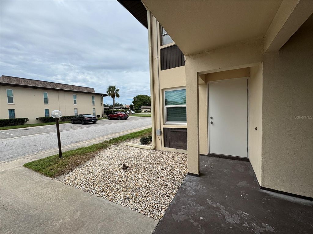 Photo of 5132 Amulet Drive #105, New Port Richey, FL 34652 (MLS # W7878902)