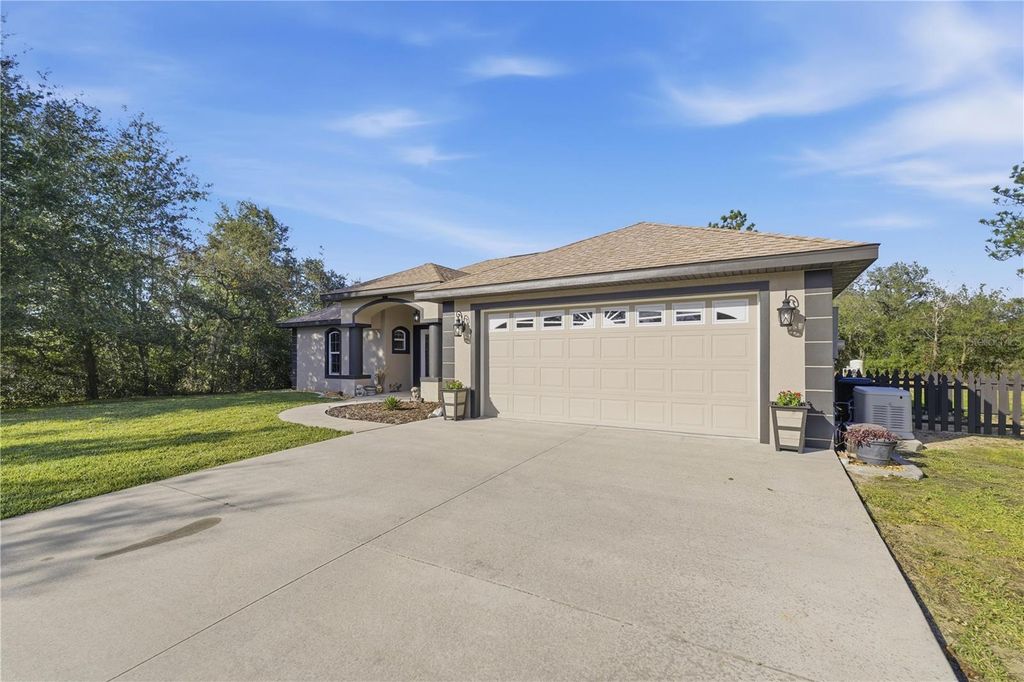 Photo of 5693 W Woodlawn Street, Dunnellon, FL 34433 (MLS # OM715559)