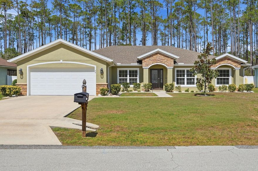 Welcome to this beautifully maintained 2019 SeaGate Willow pool home located in the desirable Cypress Knoll area of Palm Coast. This thoughtfully designed 2210 square foot 3-bedroom, 2-bath home with a dedicated office/flex space offers the perfect blend of comfort, style, and privacy.

Step inside to an open floor plan featuring tile flooring throughout the main living areas and laminate flooring in the bedrooms. The spacious kitchen is a standout with a large quartz island, quartz countertops, 42" upper cabinets, and an upgraded glass-door cabinet above the range, providing both style and storage. A generous breakfast nook and separate dining area make the home ideal for everyday living and entertaining.

The living area opens through triple sliding glass doors to a stunning saltwater pool with paver deck and full screen enclosure. Enjoy the tranquil water feature cascading into the pool and the added privacy of a fully fenced backyard with a greenbelt behind the property.

The split-bedroom layout offers privacy for the spacious primary suite, which includes dual sinks, quartz countertops, a walk-in tiled shower with built-in bench, and a separate water closet.

Additional features include:
• Stone accents on the exterior for enhanced curb appeal
• Upgraded lighting and ceiling fans throughout
• Moen faucets throughout the home
• Laundry room with utility sink
• Blinds on all windows and sliders
• Gutters with guards installed
• Flood lighting in the backyard
• Sprinkler system on city water
• Extra garage lighting, outlets, and upgraded garage window
• Generator hookup
• Pool equipment pad and electrical panel ready for a future heater

Meticulously cared for and move-in ready, this home offers modern Florida living with indoor-outdoor comfort and exceptional privacy.