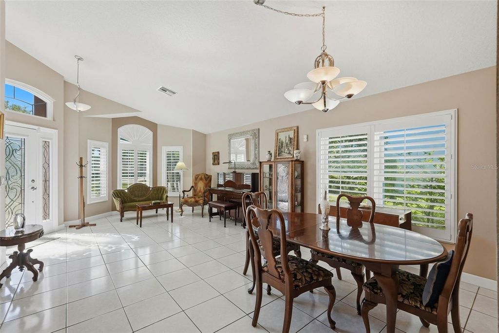 Photo of 1240 Bluffs Circle, Dunedin, FL 34698 (MLS # TB8488073)