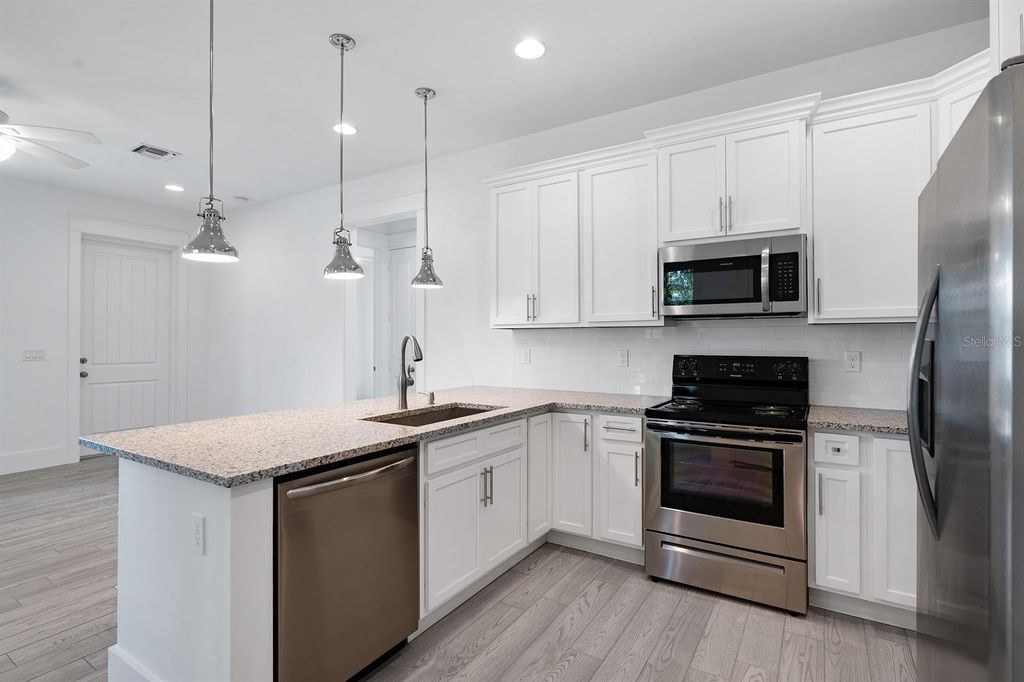 Photo of 667 SW Cleveland Avenue #2, Stuart, FL 34994 (MLS # O6368133)