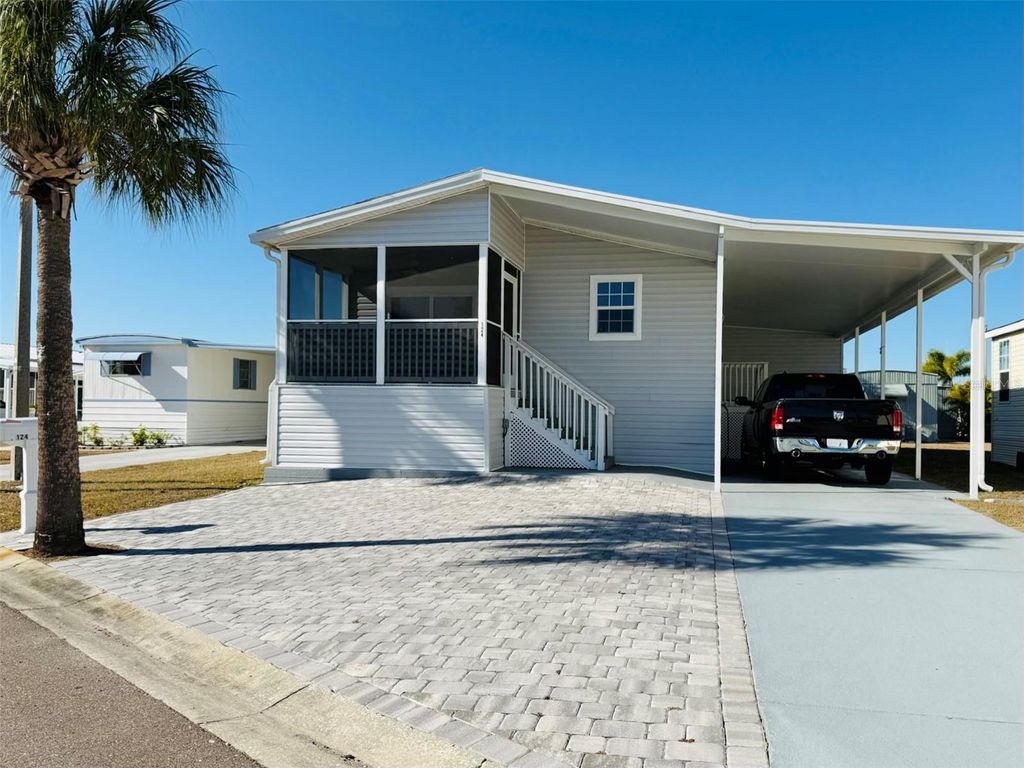 Photo of 124 E Saint Annes Circle, Apollo Beach, FL 33572 (MLS # TB8471353)