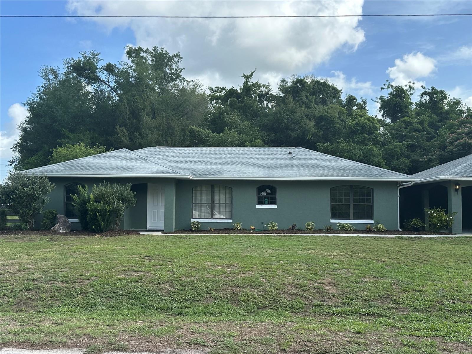 Charming 3BR/2BA with Bonus Room, Double Carport & Fully Fenced Yard in Summerfield!
Welcome to this well-maintained 3-bedroom, 2-bathroom home built in 2001, offering peaceful country-style living with convenient access to I-75 and the city of Belleview. Situated on a quiet street, this corner lot features a fully fenced backyard, fire pit, ideal for outdoor enjoyment, pets, or family gatherings.
Inside, you'll find a spacious split floor plan with new fresh interior paint, new appliances in the galley kitchen and light updates throughout.
A bonus room just off the kitchen includes the indoor washer and dryer, offering additional flexibility as a home office, mudroom, or hobby space.
Open the French doors to the backyard deck to enjoy early mornings filled with birdsong and peaceful evenings under star-filled skies. Although the home’s serene, semi-rural setting and tranquil surroundings, you’re only minutes from shopping, dining, and major highways.
Key upgrades include a newer roof(2020), HVAC system(2024), and well(2024). The attached double carport offers plenty of covered parking and storage options.
Don’t miss this opportunity to own a slice of country living with all the modern conveniences nearby. Schedule your private showing today!