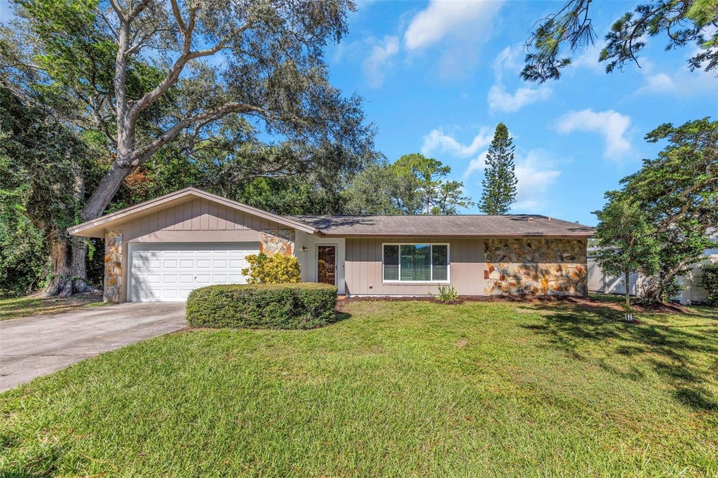 Photo of 1926 Brae Moor Drive, Dunedin, FL 34698 (MLS # TB8560406)