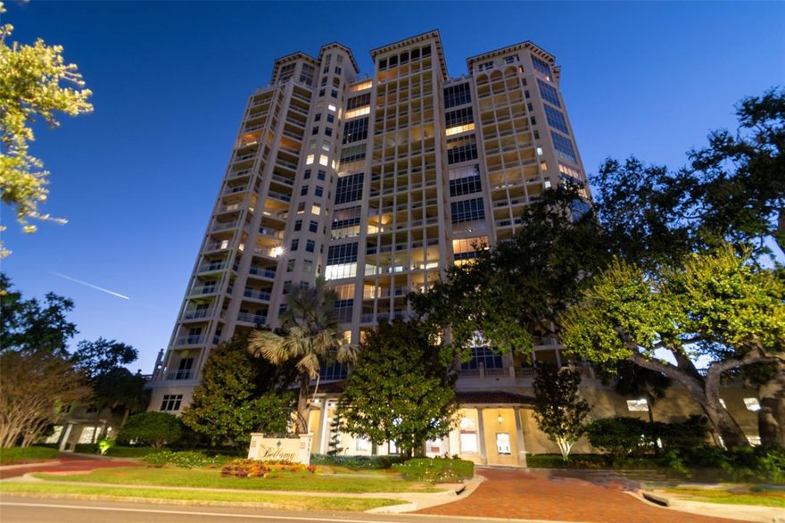 Welcome to The Bellamy on Bayshore – one of Tampa’s most luxurious high-rises, perfectly situated along Bayshore Boulevard. This 15th-floor residence offers 3 spacious bedrooms, 3.5 bathrooms, an office, and resort-style amenities, all with 220-degree panoramic views of Tampa Bay.  Arrive in style under the Bellamy’s stunning porte cochere and step into the dramatic, updated two-story lobby with beamed ceilings and daily concierge service. A private elevator takes you directly to your own private foyer, where double wood doors open to a welcoming travertine-tiled entry. Inside, the home immediately impresses with beautiful engineered wood floors and an open layout designed to maximize light and the spectacular water views.  The expansive family and dining room features walls of windows that capture 220-degree vistas of shimmering bay waters and sliding door access to the large balcony. Views of Tampa Bay that you have never seen before!  Just off the family room, an office with a large closet shares the same spectacular outlook and has sliding glass doors to the same balcony—an ideal spot to relax and take in Tampa’s natural beauty. The formal dining area flows seamlessly into the gourmet kitchen, where travertine floors, rich wood cabinetry with soft-close doors & drawers, and a granite island elevate everyday living. The kitchen also offers an eat-in area, built-in desk, gas cooktop, wall oven, and a large customizable pantry.  The primary suite is a private retreat, complete with plush carpet, sliding glass doors to a second, private balcony, dual walk-in closets, and a spa-like bath featuring travertine floors, a glass-enclosed walk-in shower, and separate water closet—all with inspiring views. Two additional bedrooms provide comfort for guests: one en suite bedroom is currently being used as an office and has great views and a large closet. Its bathroom has a tub/shower combination and granite-topped vanity.  The second en suite bedroom offers a walk-in closet, granite vanity, and walk-in shower. A full laundry room with washer, dryer, sink, and cabinets adds convenience, while a deeded storage room ensures extra space.  Life at The Bellamy extends beyond the residence. Outdoor resort-style amenities include a stunning pool, heated spa, fireplace lounge, and grilling areas, all surrounded by lush landscaping. Indoor luxuries feature private wine storage, a humidor, a library, two social rooms with bar areas and a pool table, and a professional boardroom. Separate parking garages for guests and residents offering 2 conveniently-located assigned spaces make living here as effortless as it is elegant.  Experience refined high-rise living in one of Tampa’s most desirable waterfront locations. The Bellamy on Bayshore is more than a residence—it’s a lifestyle with easy access to Bayshore Boulevard’s miles of walkways, downtown Tampa, Hyde Park, Amalie Arena, Tampa Yacht Club, shopping, cruise port, award-winning restaurants, and so much more.  Opportunities like this are rare—schedule your showing now to experience unmatched views and world-class resort amenities.  Be sure to view the virtual tour and watch the video tour, as well.