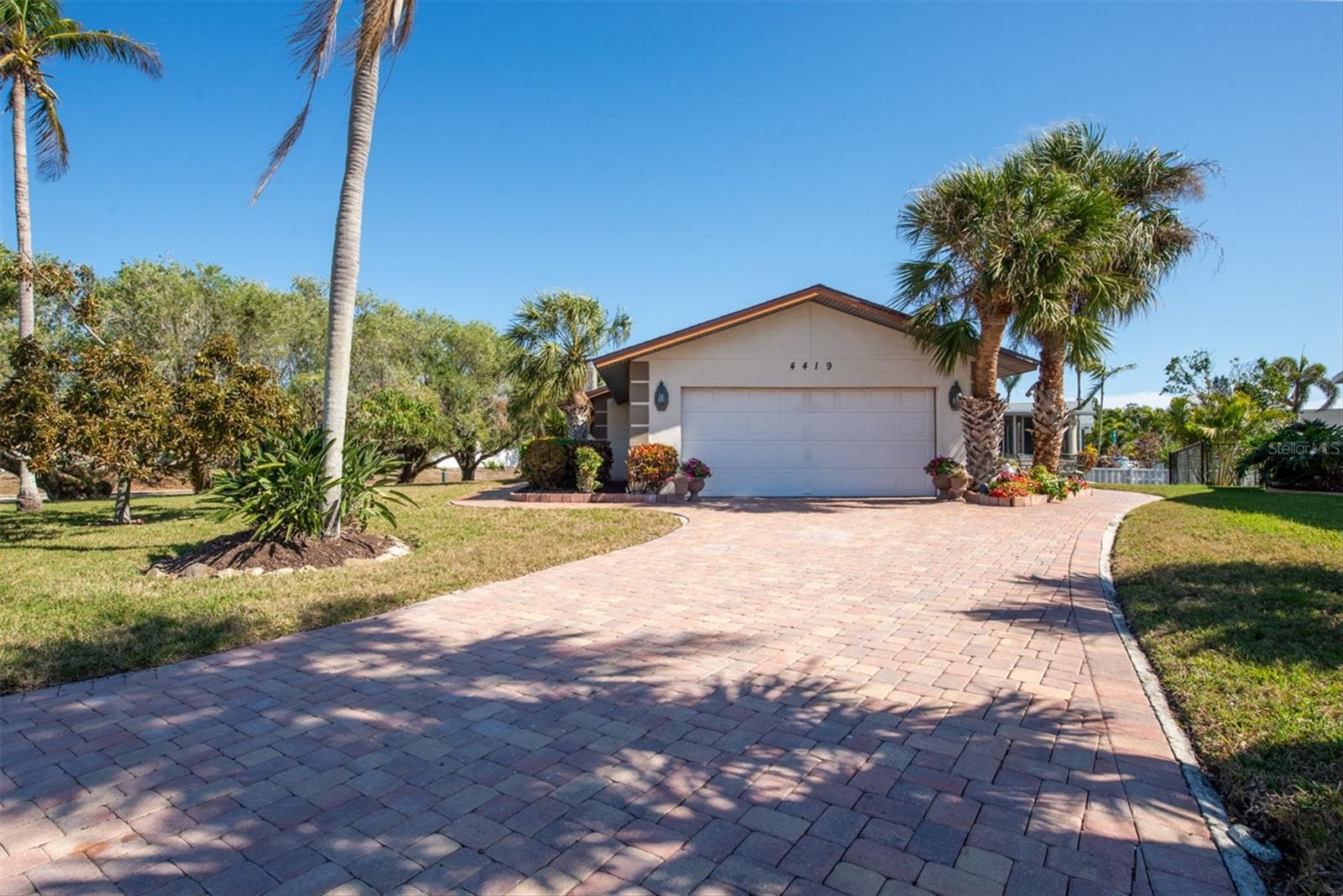 Seller is now offering 2% interest rate buy down 1st year ans 1 % the second. Up to $14000, with an acceptable offer. Welcome to this great freshwater canal-front home, offering the perfect blend of comfort and serenity. With 2 spacious bedrooms and 2 bathrooms, this home is designed for both relaxation and entertainment. Step into the bright, open-concept living area, where you’ll find a modern kitchen featuring sleek granite countertops, ideal for creating culinary masterpieces.
The indoor pool is a true standout, providing year-round enjoyment in a private enclosed space, or open all the windows and feel the cool breeze off the water. Outside, the big corner lot is beautifully landscaped, and ready for you to unwind, while the expansive deck & boat dock offers the perfect spot to sit back and enjoy breathtaking sunrises over the canal. House has a brand-new roof
Whether you're lounging by the pool, cooking in the updated kitchen, or enjoying the serene water views from the deck, this home is a tranquil retreat that you'll never want to leave.