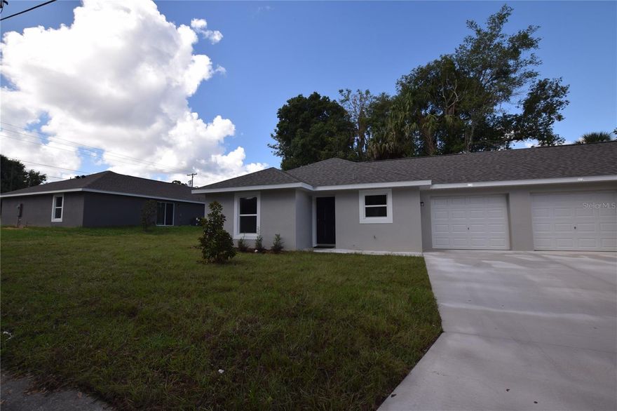 2 Bedroom, 2 Bath Duplex For Rent in Eustis, FL 32726; Range, Refrigerator, D/W, Disposal, Central Heat and A/C, 1 car garage.