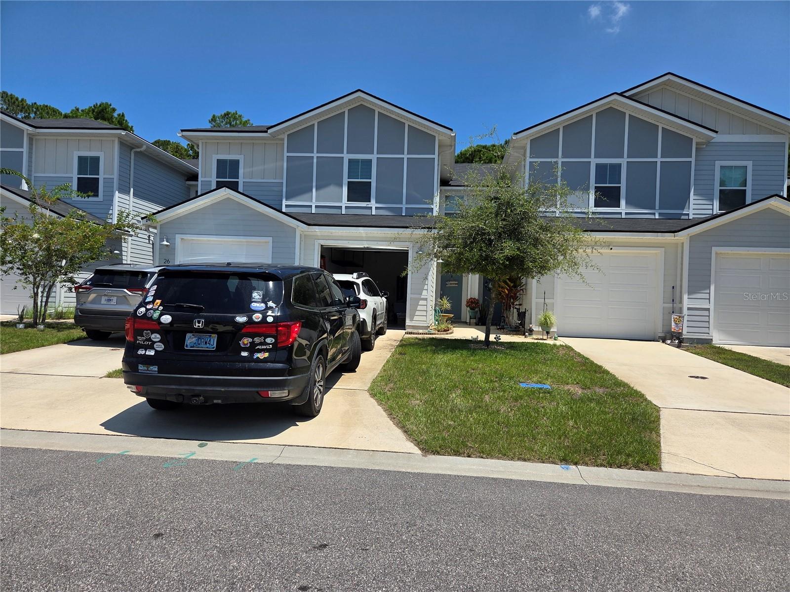 Modern Townhome in Prime St. Augustine Location | 3 Bed, 2.5 Bath | Built in 2022
Welcome to this beautifully maintained 3-bedroom, 2.5-bath townhome in the sought-after Park Ridge community, just 10 minutes from historic downtown St. Augustine! Built in 2022, this home combines stylish modern finishes with energy efficiency and low-maintenance living.
Step inside to an open-concept floor plan with 9' ceilings and luxury vinyl plank flooring throughout the main level. The gourmet kitchen features granite countertops, stainless steel Energy Star appliances, shaker cabinetry, and a large island with a double sink and Moen faucet — perfect for entertaining.
Upstairs, you’ll find all three spacious bedrooms (including a modified loft converted into a true third bedroom), two full bathrooms, and a conveniently located laundry area. The primary suite offers a peaceful retreat with plush carpet and ample natural light.
Enjoy the privacy of a fenced-in backyard that backs to a lush nature preserve, with no rear neighbors. The patio is ideal for grilling, relaxing, or stringing up lights for evening ambiance. A 1-car garage adds extra storage and convenience.
Other features include:
8' modern front and rear doors
Granite counters throughout
Window blinds and wood-trimmed window surrounds
Smart layout with tons of natural light
Remaining 7 years on a 10-year builder’s home warranty
Being sold fully furnished—move-in ready!
Pet-friendly community
Community pool access included
Park Ridge offers a serene, tree-lined environment while being close to shopping, dining, top-rated schools, and major roads. This home is ideal for first-time buyers, investors, or anyone seeking low-maintenance Florida living close to the coast.
Don’t miss your chance to own this move-in ready gem in Park Ridge—schedule your showing today!