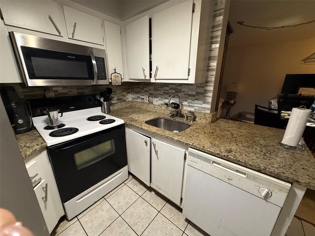 Photo of 3940 Atrium Drive #L7, Orlando, FL 32822 (MLS # O6410204)