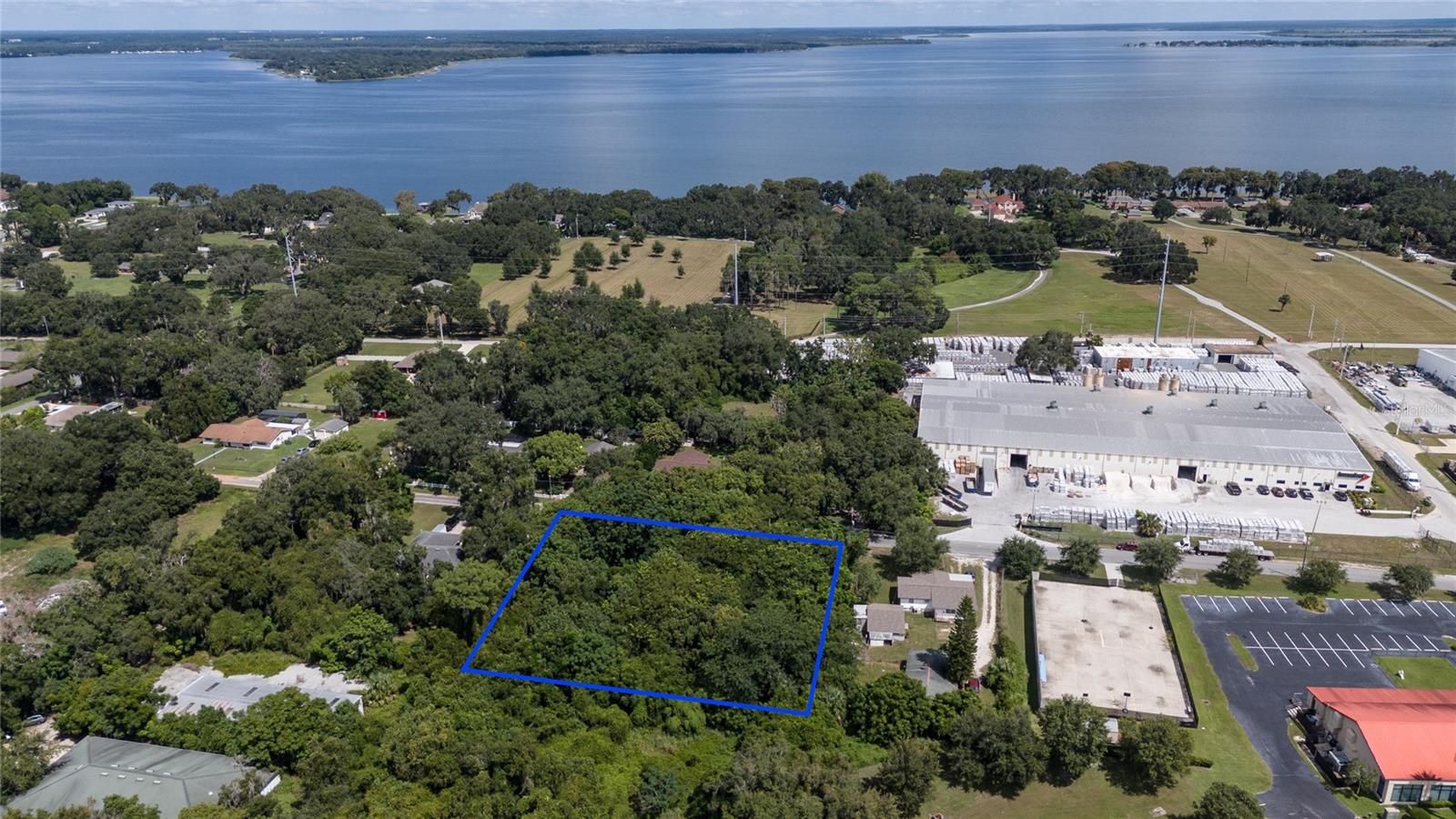 This property features dual zoning, allowing for both R-1 Residential and/or C-2 Commercial uses in Lake County. Situated just off Hwy 441, it lies on a street that hosts a blend of single-family homes and commercial buildings. Its convenient location is near UF Health Leesburg Hospital, downtown Leesburg, Ski Beach, and Beacon College. Additionally, there is potential for annexation into the City of Leesburg.