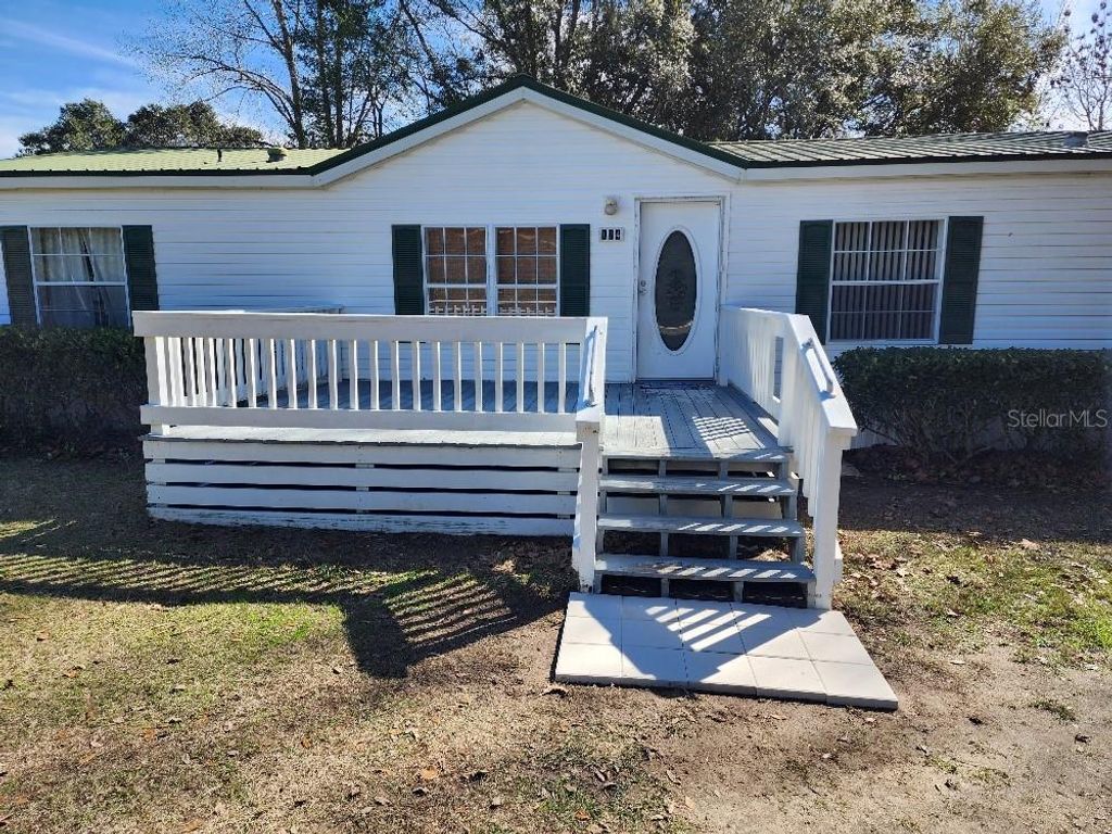 Photo of 124 SE Loxley Glen, Lake City, FL 32024 (MLS # O6376612)
