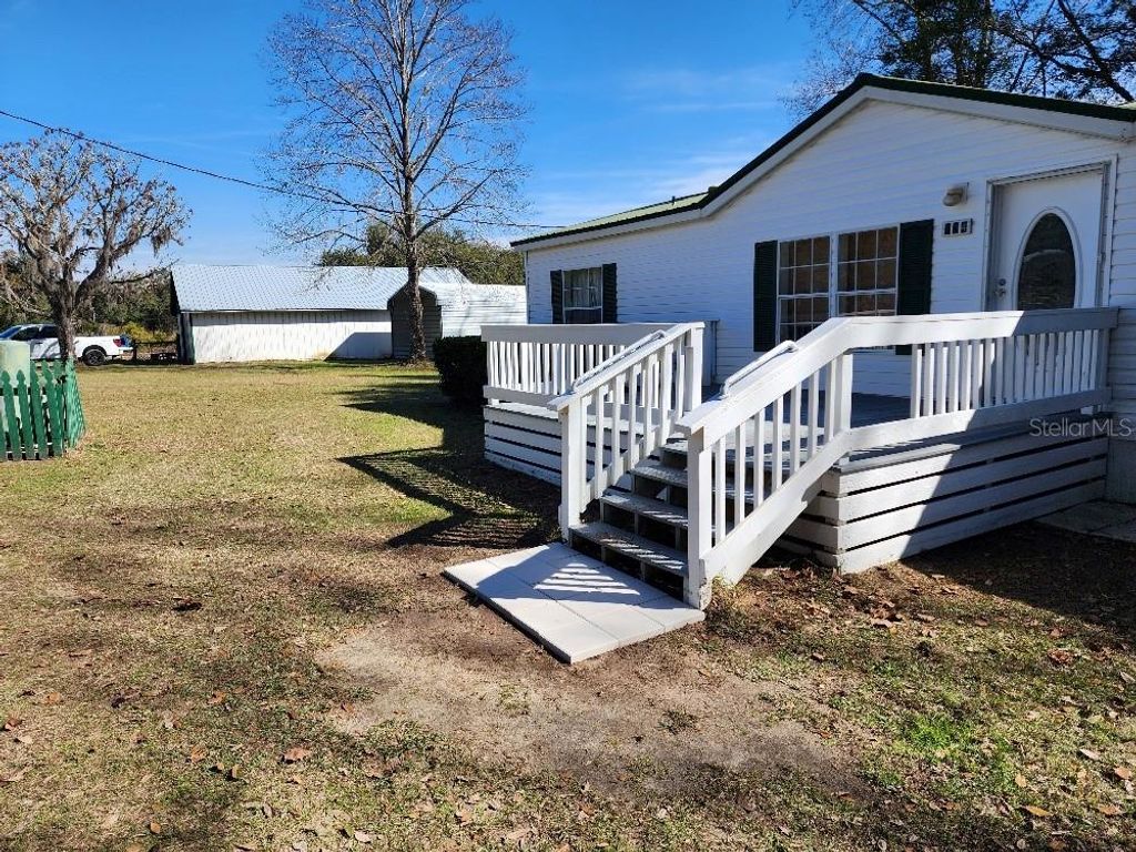 Photo of 124 SE Loxley Glen, Lake City, FL 32024 (MLS # O6376612)