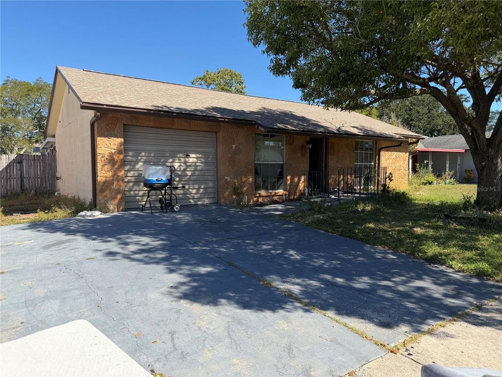 Photo of 7645 Arlight Drive, New Port Richey, FL 34655 (MLS # TB8450737)