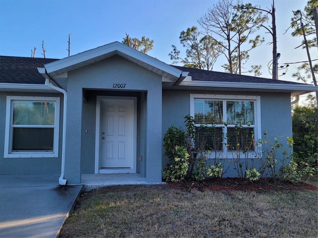 Photo of 12007 Henley Avenue, Port Charlotte, FL 33981 (MLS # D6146039)