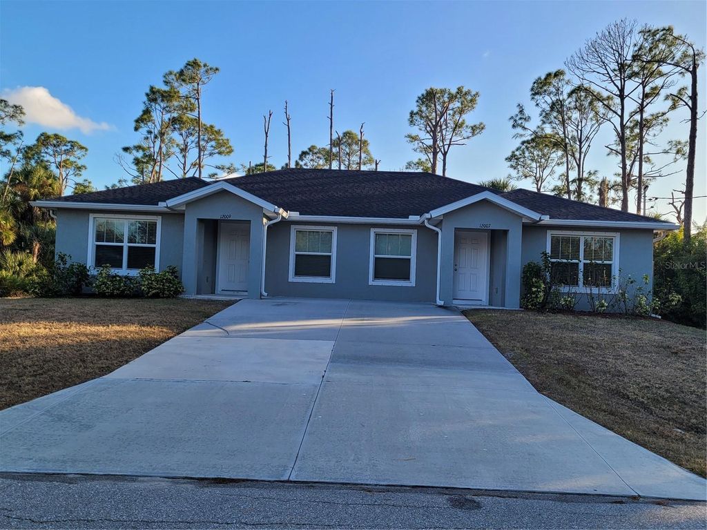 Photo of 12007 Henley Avenue, Port Charlotte, FL 33981 (MLS # D6146039)