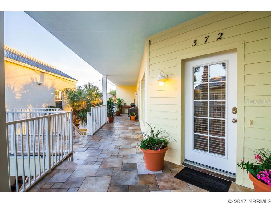 Nestled atop the restaurants, shops and nightlife of New Smyrna Beach's popular Flagler Avenue, you'll find a welcoming retreat only 2 blocks from the beach. Freshly painted throughout, this 2-bedroom, 2-bath unit features an open floor plan, plantation shutters, and a private balcony that puts the world at your feet. With tranquil hues, high ceilings and bamboo flooring, this hideaway offers a beautiful place to be. This unit includes reserved parking for one vehicle. Walk to the beach, stroll the galleries or step downstairs to enjoy a pedicure and a bite to eat. Don't let this one slip away! All measurements are approximate. ;LocationDescription: Condo ;Water: City