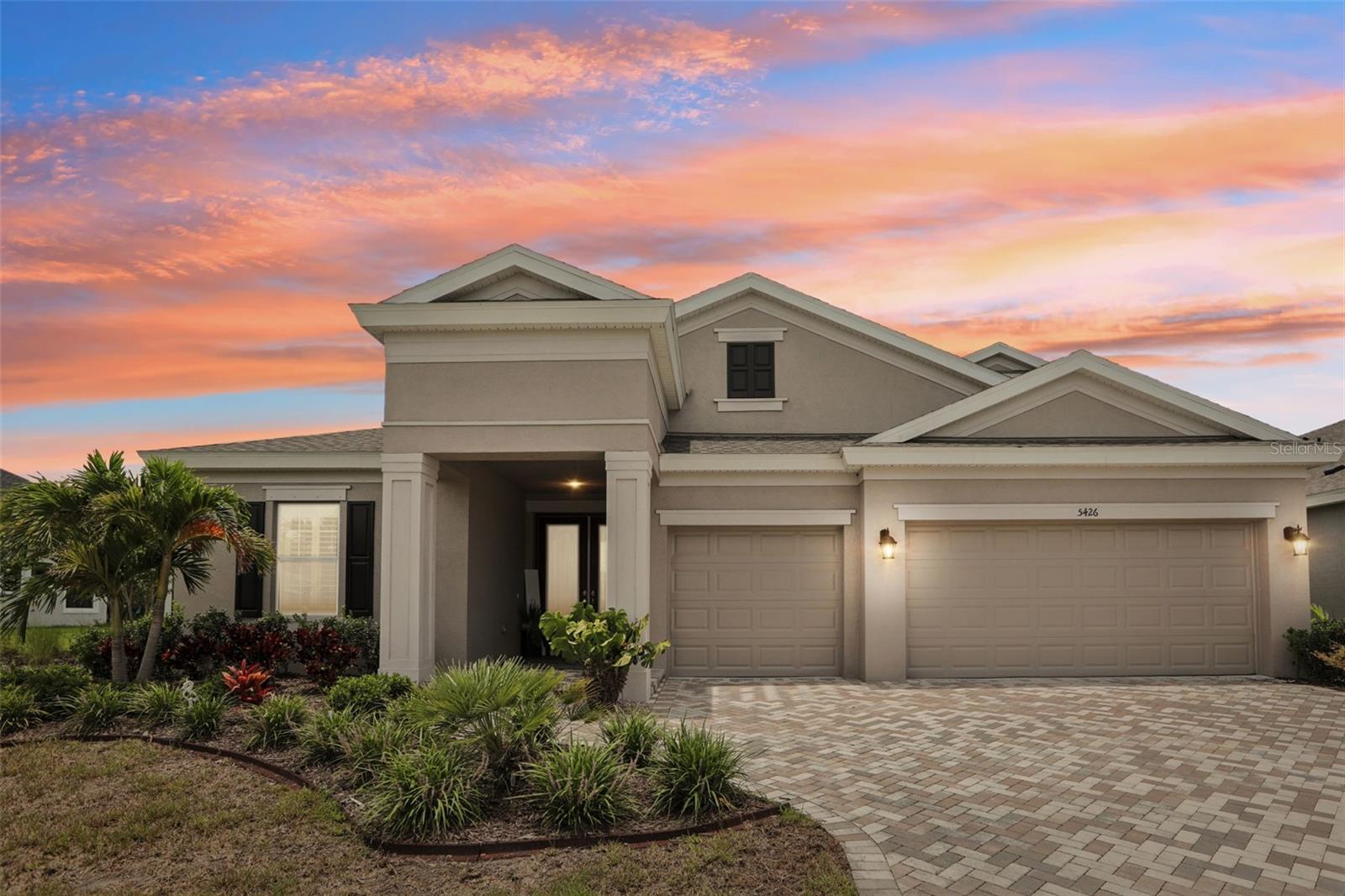 This stunning pool home backs to peaceful conservation, with no rear neighbors and a lush Florida view that feels like your own private oasis! Inside, 5 spacious bedrooms and 4 full baths offer room to stretch out, with luxury plank flooring throughout and an open layout that flows from the kitchen, dining room and family room. The kitchen features stone counters, built-in oven, and beverage fridge. The family room is an airy living space framed by oversized sliders that open almost wall to wall! The private ensuite is oversized, with double vanities, a walk in shower, and a private water closet. Upstairs, a private bonus room with extra bedroom and bath rounds out the space. Step outside to a gorgeous pool with sun shelf and space to add an umbrella to create a true outdoor paradise. Schedule your tour today! Don't forget to view the 3D Walkthrough